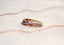 A rose gold diamond ring